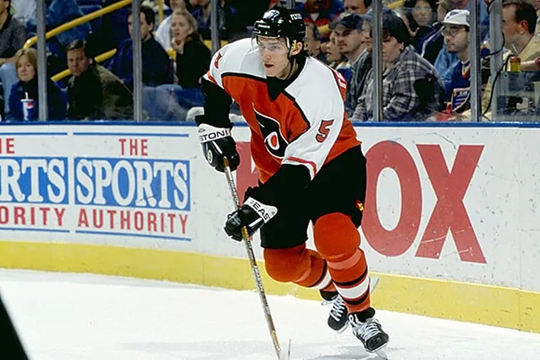 Dmitri Tertyshny of the Philadelphia Flyers during a game in March of 1999. (Elsa Hasch/Allsport)