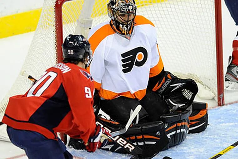 Ilya Bryzgalov is turning into the netminding monster the Flyers banked on him to be. (Nick Wass/AP)