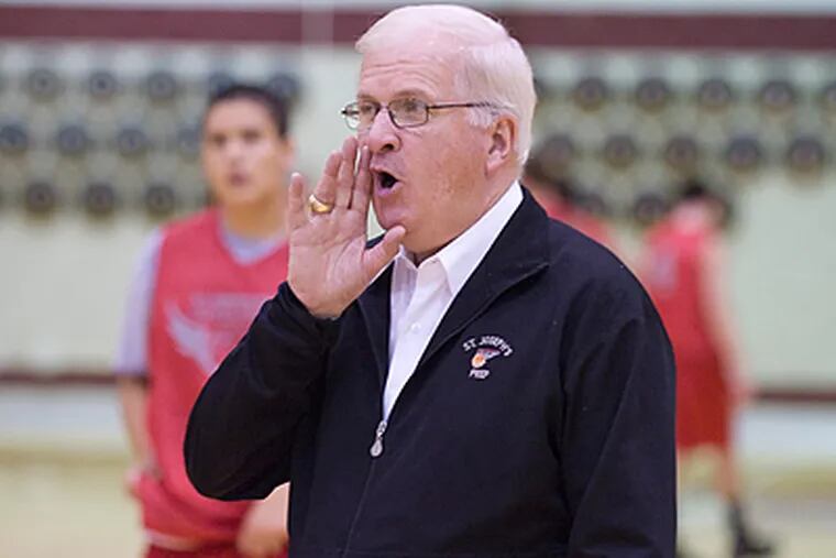 Legendary coach Speedy Morris, now in his 10th year at St. Joe's Prep, yells instructions. (Clem Murray / Staff Photographer)