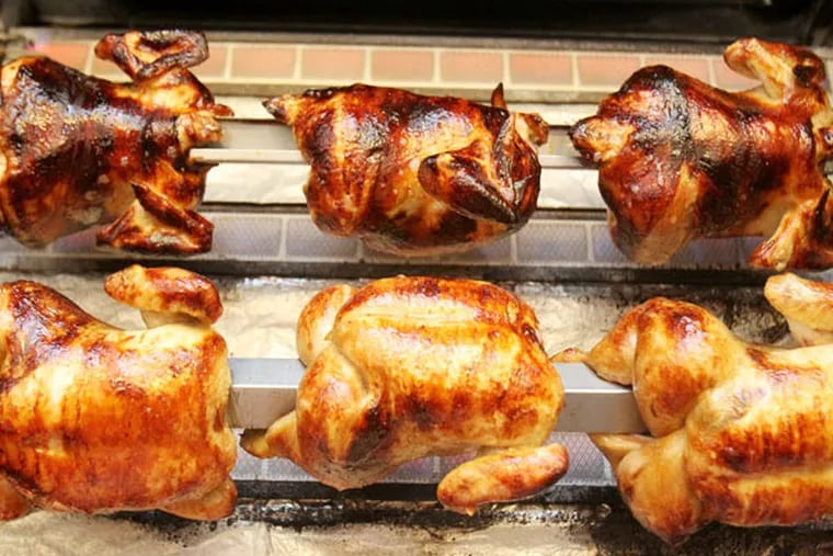 Spit-roasted chickens at Rotisseur - $17 apiece, and primo.  CHARLES FOX / Staff Photographer