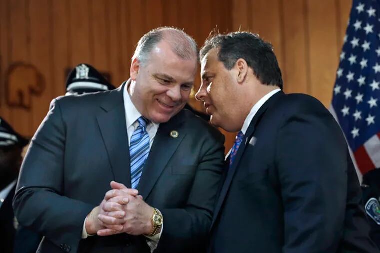 State Senate President Stephen Sweeney (left) and Gov. Christie. &quot;The only one who benefits from Sweeney burying this bill is Gov. Christie,&quot; said one political analyst, as other Democrats are united behind the magazine limit. (Mel Evans / AP)