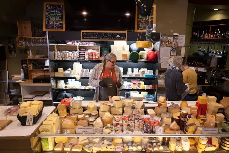 "I've never, ever, ever seen anything like this," Tammy Schumacher said of the worker shortage. She is the Cheese Shop's cheese board manager. CREDIT: Photo for The Washington Post by Julia Rendleman