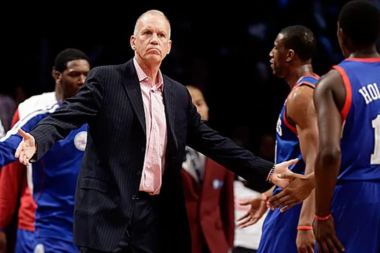 The Sixers will play eight road games, starting with the 95-92 loss in Brooklyn on Sunday and finishing on Jan. 5 in San Antonio. (Seth Wenig/AP)