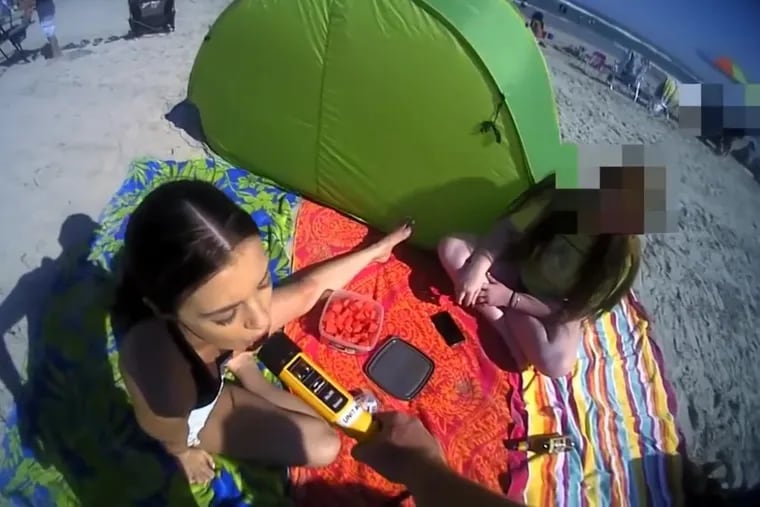 Emily Weinman, 20, of Philadelphia was enjoying a day at the beach when she got into a clash with a Wildwood police officer who instructed her to take a breathalyzer test that came back negative.