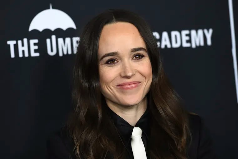 FILE - Elliot Page arrives at the Los Angeles premiere of "The Umbrella Academy" on Feb. 12, 2019. Page, the Oscar-nominated actor of “Juno”, “Inception” and “The Umbrella Academy” came out as transgender on Tuesday in an announcement greeted as a watershed moment for the trans community in Hollywood. The 33-year-old actor from Nova Scotia said his decision came after a long journey and with much support from the LGBTQ community.