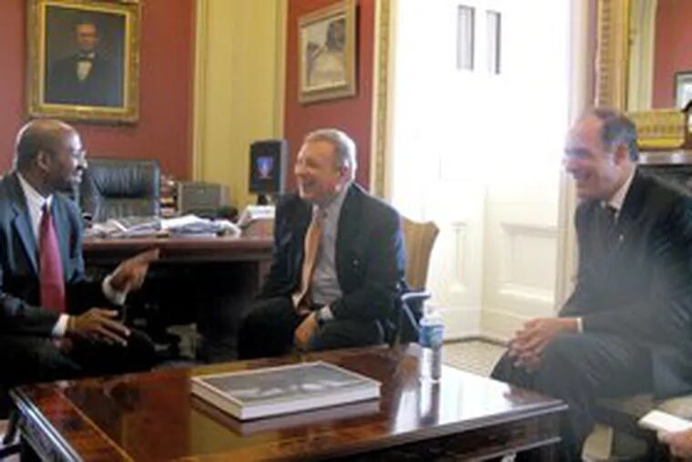 Philadelphia mayoral candidate Michael Nutter (left) meets with a pair of Democratic senators, Majority Whip Dick Durbin (center) of Illinois and Pennsylvania freshman Robert Casey Jr.