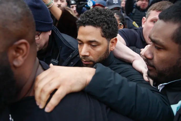 "Empire" actor Jussie Smollett leaves Cook County jail following his release, Thursday, Feb. 21, 2019, in Chicago. Smollett was charged with disorderly conduct and filling a false police report when he said he was attacked in downtown Chicago by two men who hurled racist and anti-gay slurs and looped a rope around his neck, a police official said.