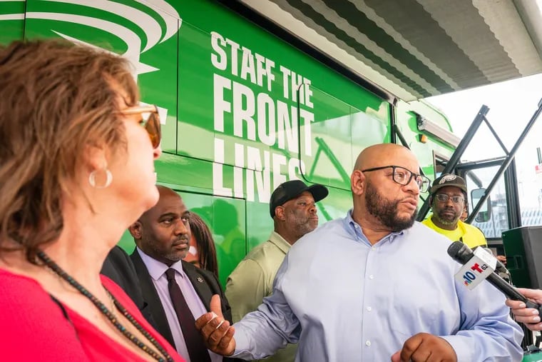 Former AFSCME District Council 33 President Ernest Garrett speaks with the media after an August 2023 press conference that focused on the need to fill city jobs amid a widespread staffing shortage.