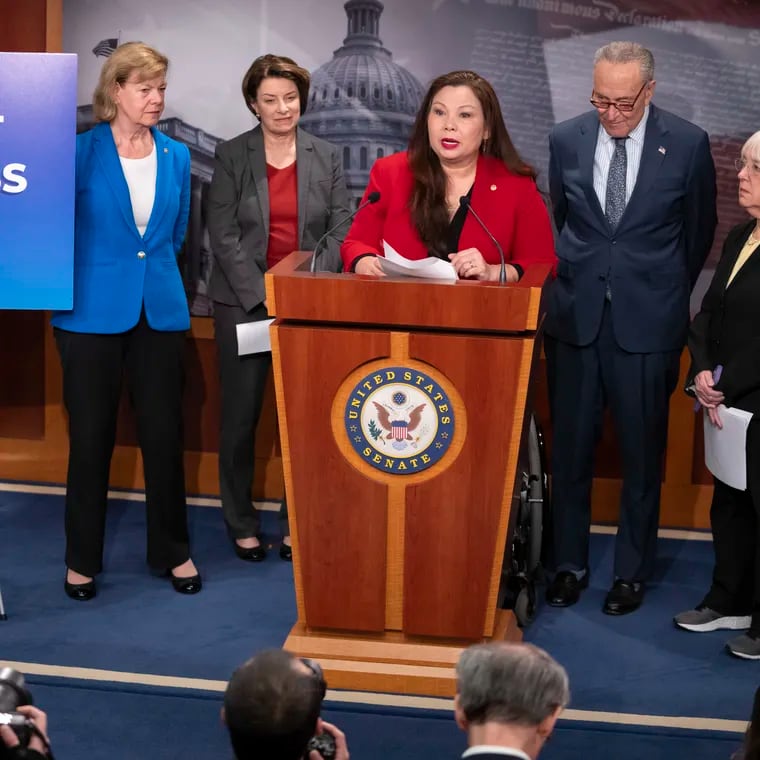 Sen. Tammy Duckworth, D-Ill., center, speaks about a bill to establish federal protections for IVF as, from left, Sen. Tammy Baldwin, D-Wis., Sen. Amy Klobuchar, D-Minn., Senate Majority Leader Chuck Schumer of N.Y., and Sen. Patty Murray, D-Wash., listen during a press event on Capitol Hill in Washington.