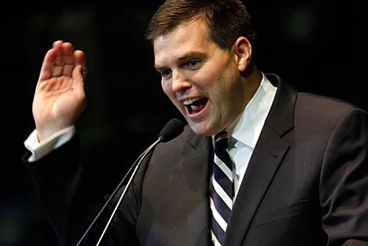 Jay Paterno imitates his dad during Thursday's memorial service. (Laurence Kesterson/Staff Photographer)