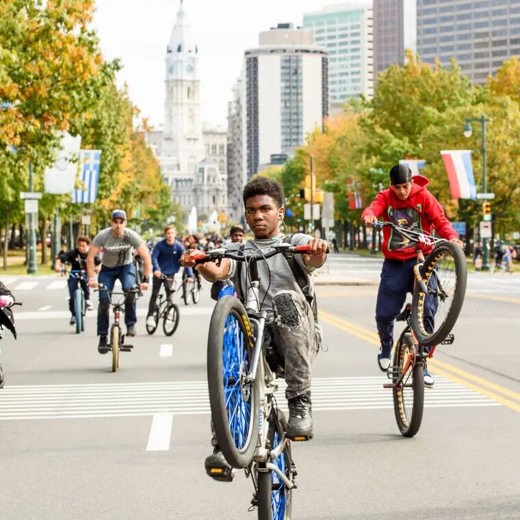 A scene from "Swerve," with a large group of riders performing tricks and riding along the Benjamin Franklin Parkway. The film screens this Saturday at Penn's Annenberg Center.