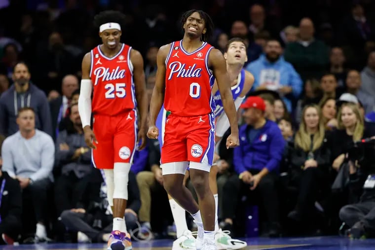 Sixers guard Tyrese Maxey reacts after hurting his foot during the second quarter Friday against the Bucks.