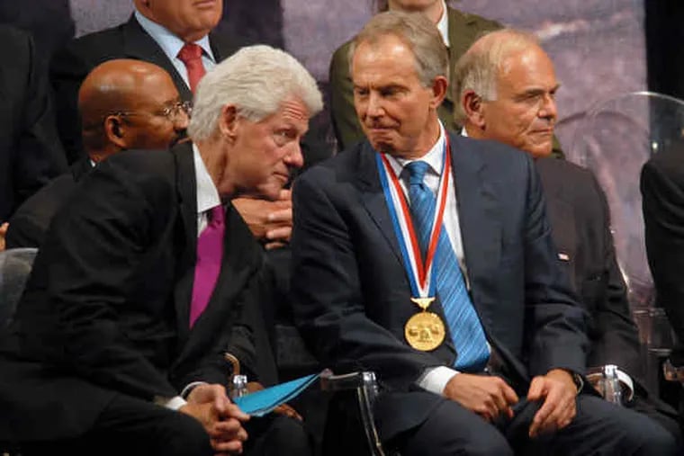 Bill Clinton with Tony Blair - wearing his 2010 Liberty Medal - along with Mayor Nutter (behind Clinton) and Gov. Rendell.
