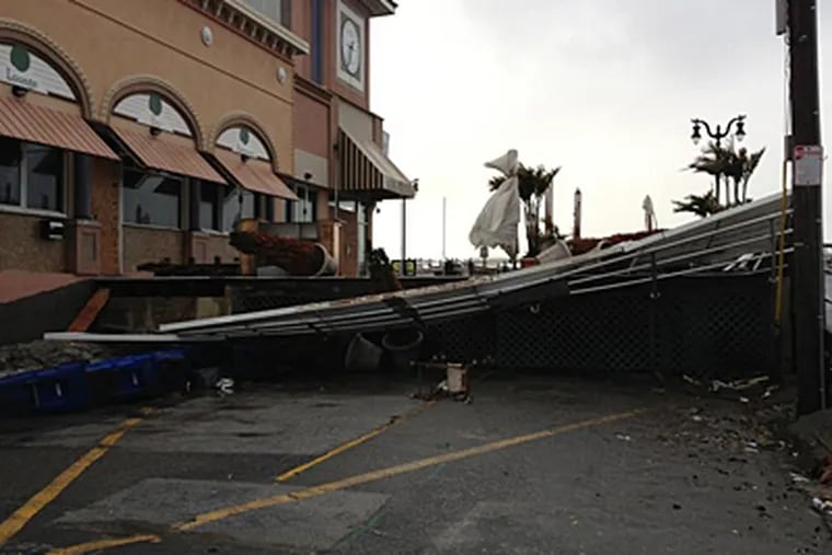 Storm damage near the A.C. Boardwalk this morning. (Aubrey Whelan/Staff)