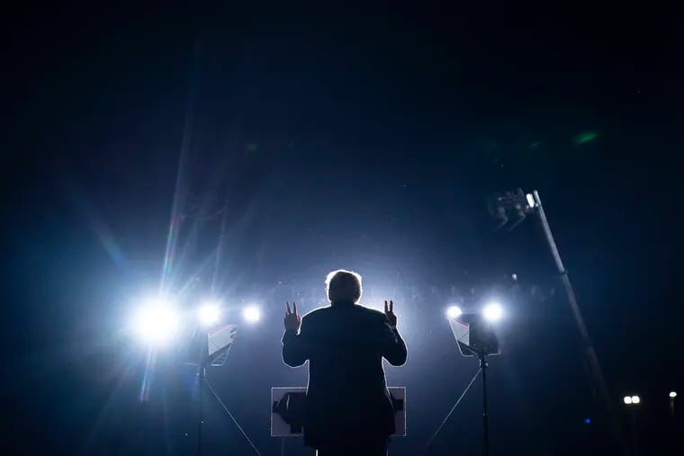 Former president Donald Trump speaks to supporters during a rally at the Iowa State Fairgrounds on Saturday in Des Moines, Iowa.