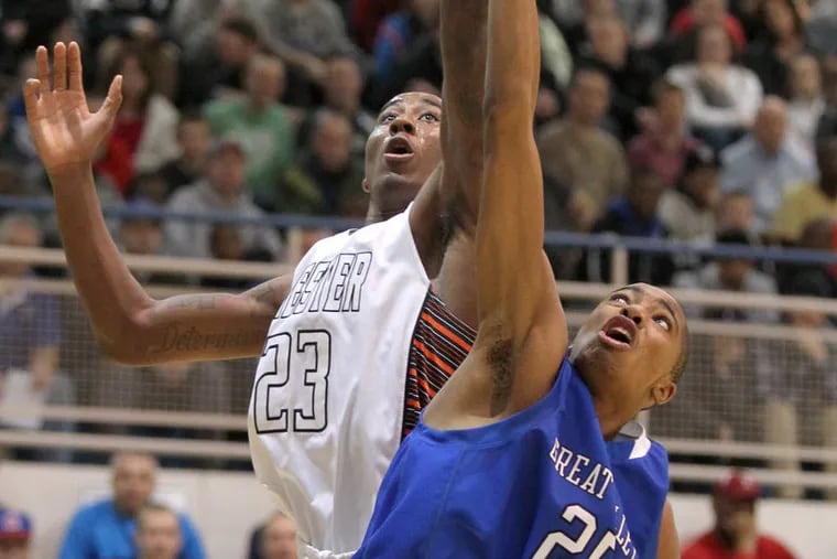 Rondae Jefferson, left, of Chester, and Mikal Bridges of Great Valley go after a rebound in the first quarter of the PIAA Class AAAA  State Boys Basketball Quarterfinals held at Spring-Ford High School in Royersford.   ( CHARLES FOX / Staff Photographer )