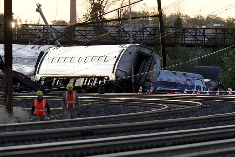 The sun rises Wednesday, May 13, 2015 on the tracks where the day before Amtrak Train 188 derailed at the sharp Frankford Junction curve. ALEJANDRO A. ALVAREZ / Staff Photographer