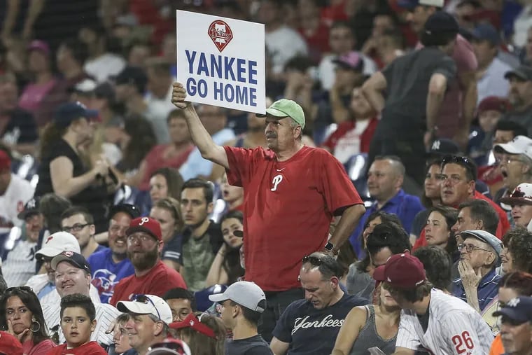 A fan with a sign Phillies vs. Yankees during the 9th inning at Citizens Bank Park in Philadelphia, Tuesday, June 26, 2018. Yankees shutout the Phillies 6-0.