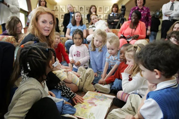 Sarah Ferguson reads her book &quot;Little Red&quot; to children from area Ronald McDonald Houses during a visit to the Philadelphia Ronald McDonald House.