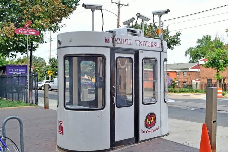 A security kiosk equipped with four video cameras monitors traffic on the edge of Temple University's campus.