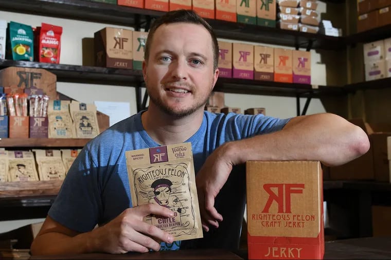 Brendan Cawley is shown with his jerky products at the Righteous Felon Jerky Cartel in West Chester, Pa. on  Oct.  2, 2018. Cawley's title is Chief Trafficking Officer, and his firm ranks as one of the Philly 100 fastest growing firms.