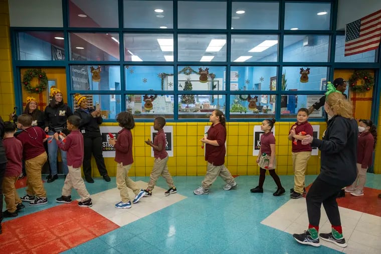 Philadelphia students' math scores are up, and English scores are down slightly. The Philadelphia School District's enrollment is up incrementally, too, according to preliminary 2023-24 numbers released recently. Students at Muñoz-Marín Elementary School are shown in this 2022 file photo.