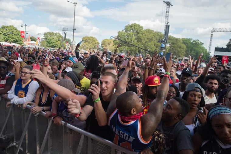 The crowd dances during Pusha T’s set at the Made in America Festival.