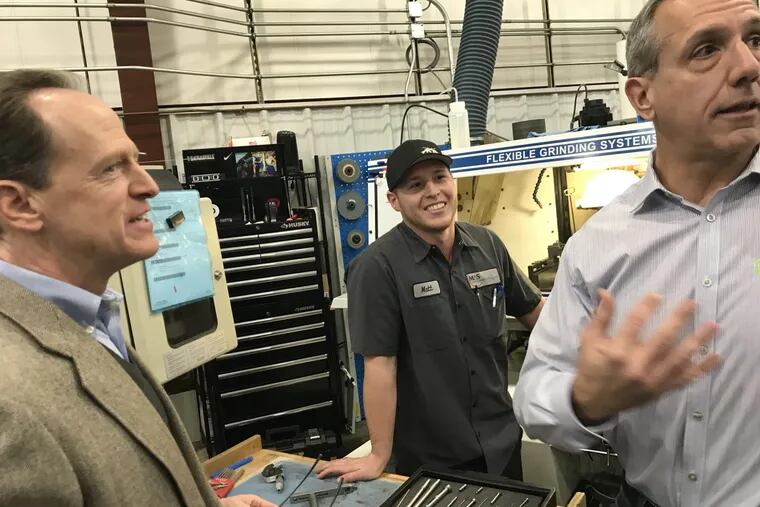 (From left) U.S. Sen. Patrick Toomey, R-Pa., with Matt Meindl, supervisor, and John Shegda, second-generation owner, at M &amp; S Centerless Grinding, a Hatboro, Pa. machine shop. Toomey says the trillion-dollar tax cut passed by Congress and signed by President Trump will pay for itself as the U.S. economy accelerates. Shegda says he's planning on hiring 3 extra workers thanks to the tax cut, beyond the 7 he already planned to add to his staff of 40 in Hatboro and Warminster this year.