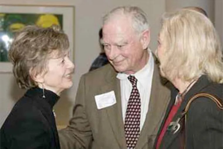 Kaki Gladstone (left) at her retirement party with H.F. &quot;Gerry&quot; Lenfest, president of the Art Museum's board of trustees, and his wife, Marguerite. Gladstone had worked in volunteer services at the museum since 1964.