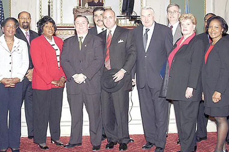 Joseph Mammana (center, hat in hand) pictured with City Council in March 2004 after passage of a resolution in his honor (Photo courtesy the City of Philadelphia)