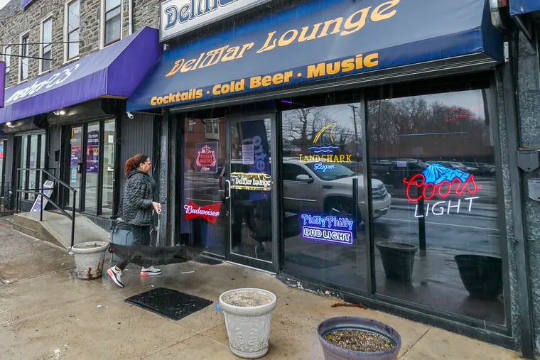 A longtime bar employee was shot and killed during a robbery at Germantown's DelMar Lounge at closing time early Thursday.