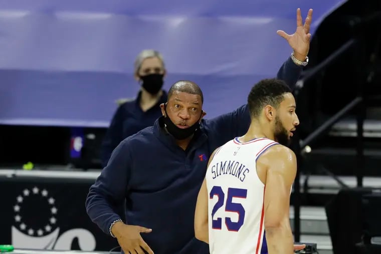 Sixers coach Doc Rivers with guard Ben Simmons during a game against the Charlotte Hornets in January.
