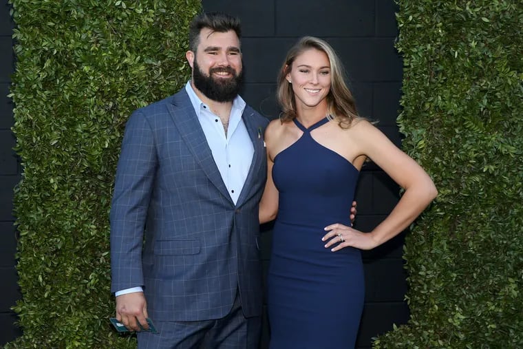 Jason Kelce and wife Kylie Kelce pose for photos while entering the Eagles' Super Bowl championship ring ceremony at 2300 Arena in South Philadelphia on Thursday, June 14, 2018. Players received their Super Bowl rings at the private ceremony.