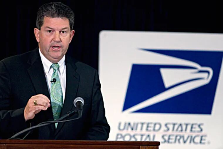 The Postal Service is awash in red ink. In September, Patrick Donahoe, postmaster general, talked about coming changes. (Evan Vucci / Associated Press, File)