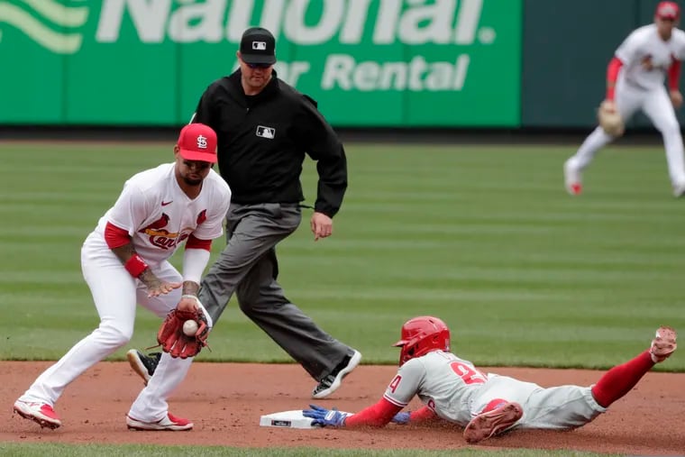 Phillies outfielder Roman Quinn steals second base in the second inning of Thursday's 3-2 loss to the Cardinals in St. Louis.
