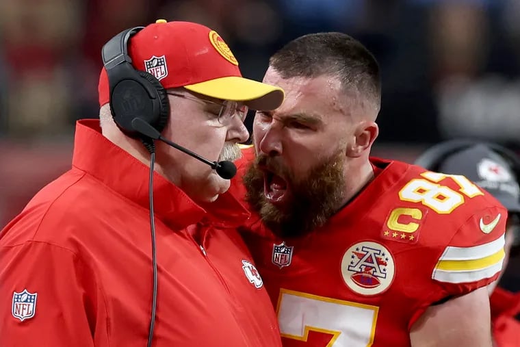 Travis Kelce of the Kansas City Chiefs yells at head coach Andy Reid during the first half of Super Bowl LVIII.