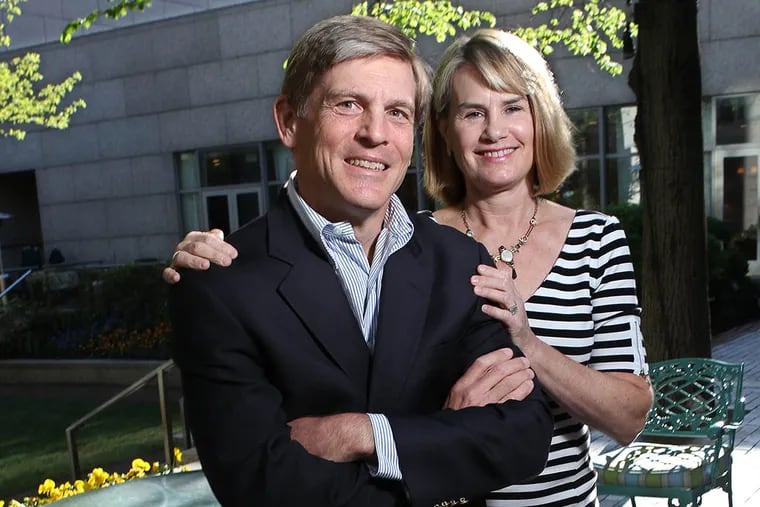 John S. Middleton, left and his wife, Leigh Middleton, right, at the Four Seasons in Philadelphia. (Michael Bryant/Staff Photographer)