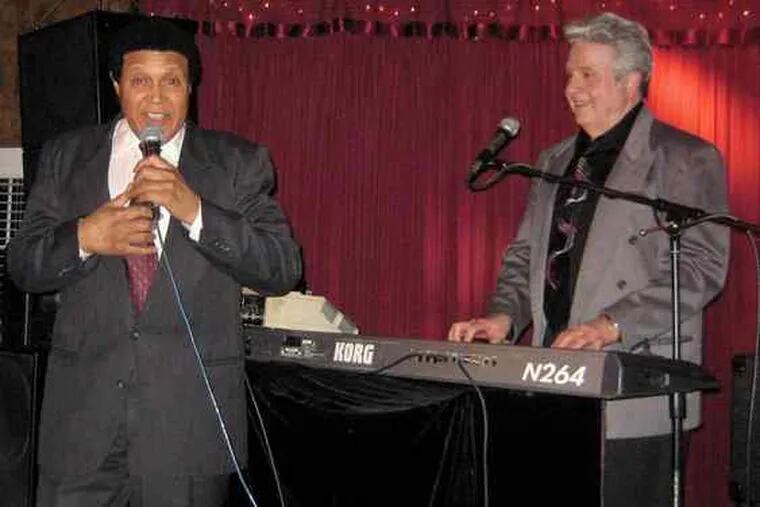 Chubby Checker joins Nicky DeMatteo, a friend from school days, for a song during DeMatteo&#0039;s weekly gig at Ventura&#0039;s in Voorhees. (See &quot;Show biz.&quot;)