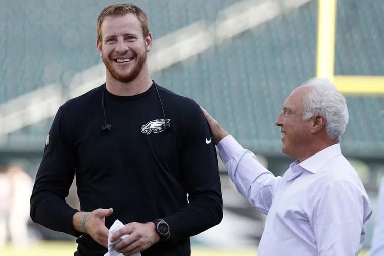 Philadelphia Eagles owner Jeffrey Lurie and Carson Wentz must now make do after Lurie fired coach Doug Pederson (not pictured).