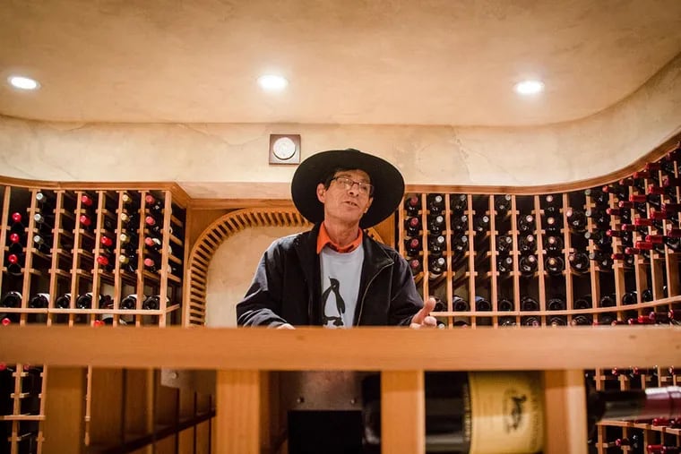 Scot “Zippy” Ziskind of Zipco Wine Cellars in a cellar he built in Bryn Mawr. If the state did approve medical marijuana, Ziskind could be a force. (MEAGHAN POGUE / Staff Photographer)
