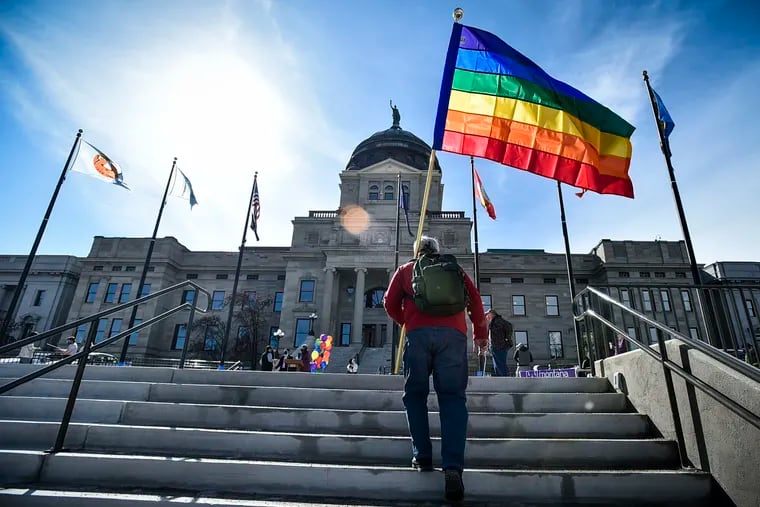 Demonstrators in support of LGBTQ rights gathered in March on the steps of the Montana Statehouse in Helena.