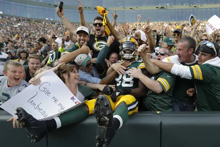 Green Bay Packers&#039; Ty Montgomery celebrates his touchdown run with fans during the second half of an NFL football game against the Seattle Seahawks Sunday, Sept. 10, 2017, at Lambeau Field in Green Bay, Wis.