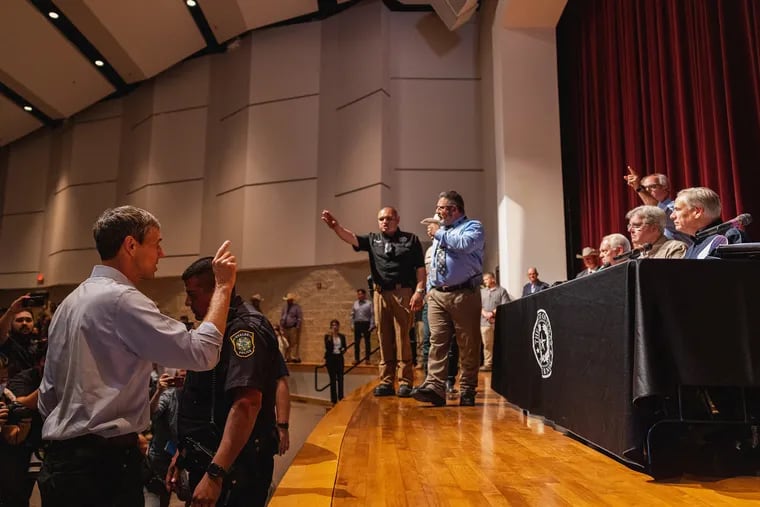 Democratic gubernatorial candidate Beto O'Rourke interrupts a press conference held by Texas Gov. Greg Abbott on Wednesday following the shooting at Robb Elementary School,