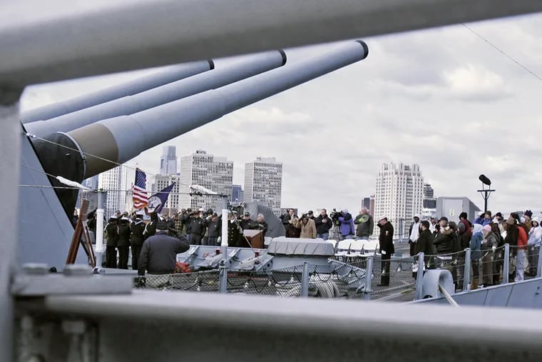 There are often encampments on the Battleship New Jersey, but this one is timed to coincide with the papal visit. (Elizabeth Robertson/Staff Photographer)