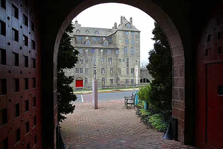 Profile of the Borough of Doylestown.  The Mercer Museum is seen through an archway at the entrance to the Michener Museum.   ( Charles Fox / Staff Photographer )