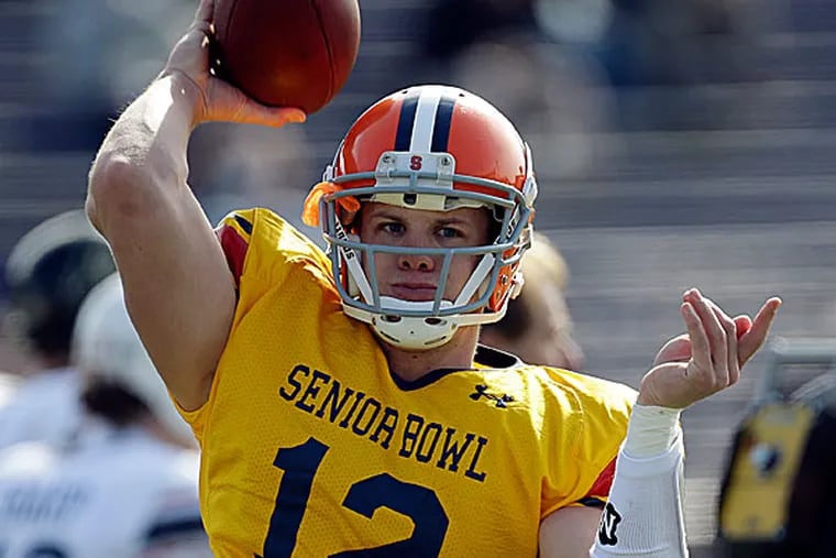 Ryan Nassib, Eagles season ticket holder, met with his hometown team, and the Syracuse quarterback had the expected reaction to the meeting. (Dave Martin/AP)