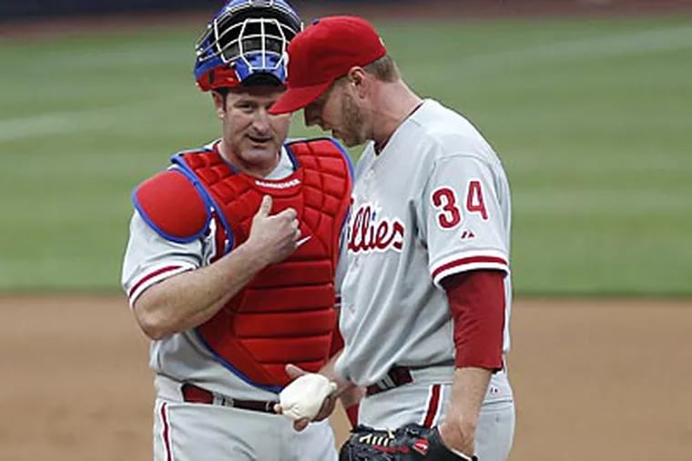 Roy Halladay pitched seven innings, allowed two runs and struck out five against the Padres. (Lenny Ignelzi/AP)