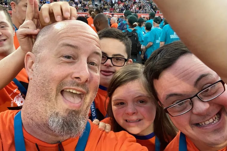 William Scully, a beloved counselor, coach and volunteer, died Nov. 15. He was 49. He's pictured here with members of a Special Olympics team he coached.