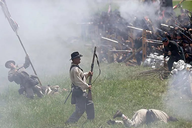 Thousands re-created Pickett's Charge Sunday in Gettysburg, the first of two huge reenactments planned this week. The three-day battle, a pivotal clash in the Civil War, marked the northernmost advance of Confederate forces. (AP)