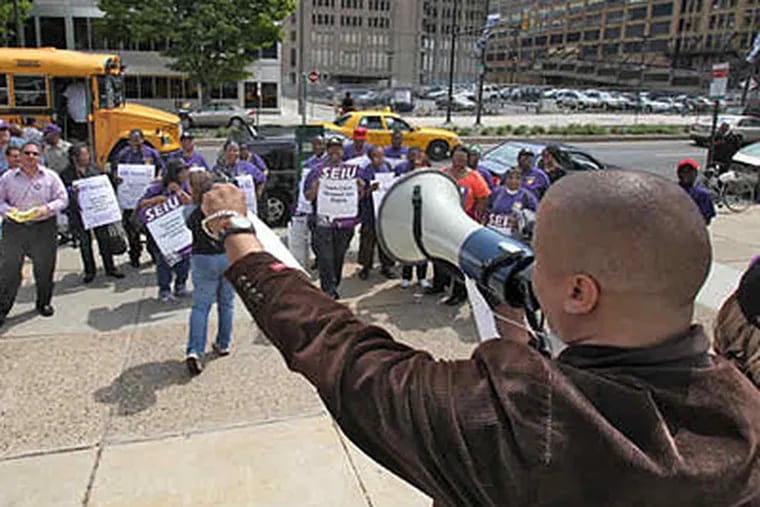 April 2010 file photo: Hector Abreu, an organizer with the Service Employees International Union, addresses a rally outside Philadelphia School District offices at 440 N. Broad St. (David M Warren/Staff)